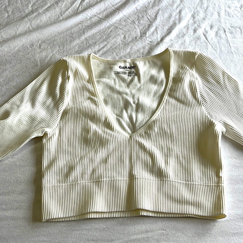 Garage crop top size S selling for $10